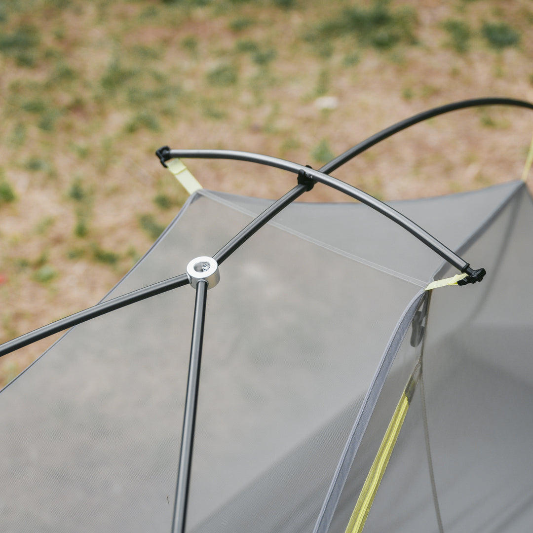 Interior of Naturehike Star Trail tent showing elevated center peak and spacious headroom for sitting upright.