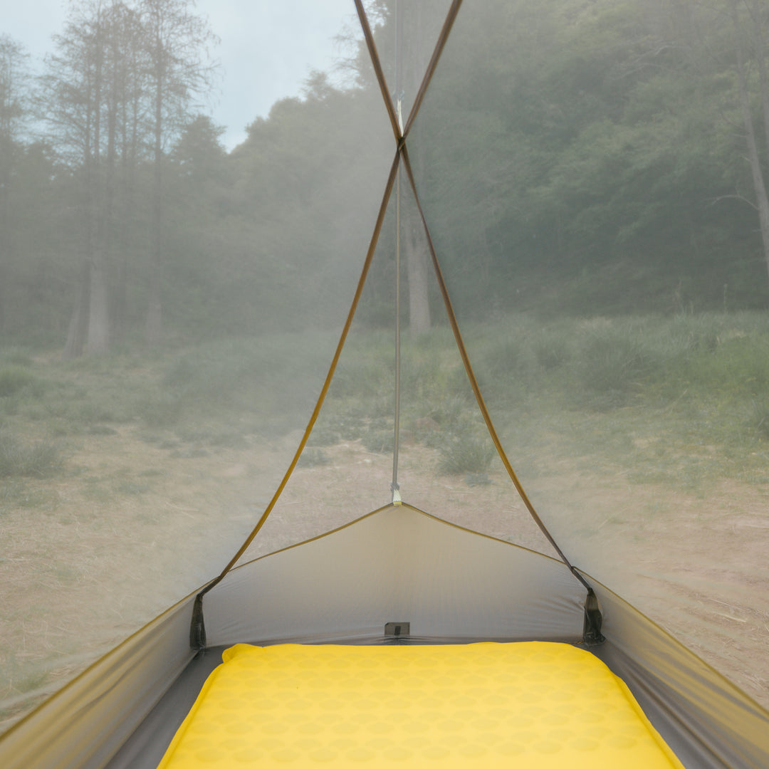 Ventilation feature of Naturehike Star Trail tent, mesh inner tent and elevated clearance for airflow and bug protection.